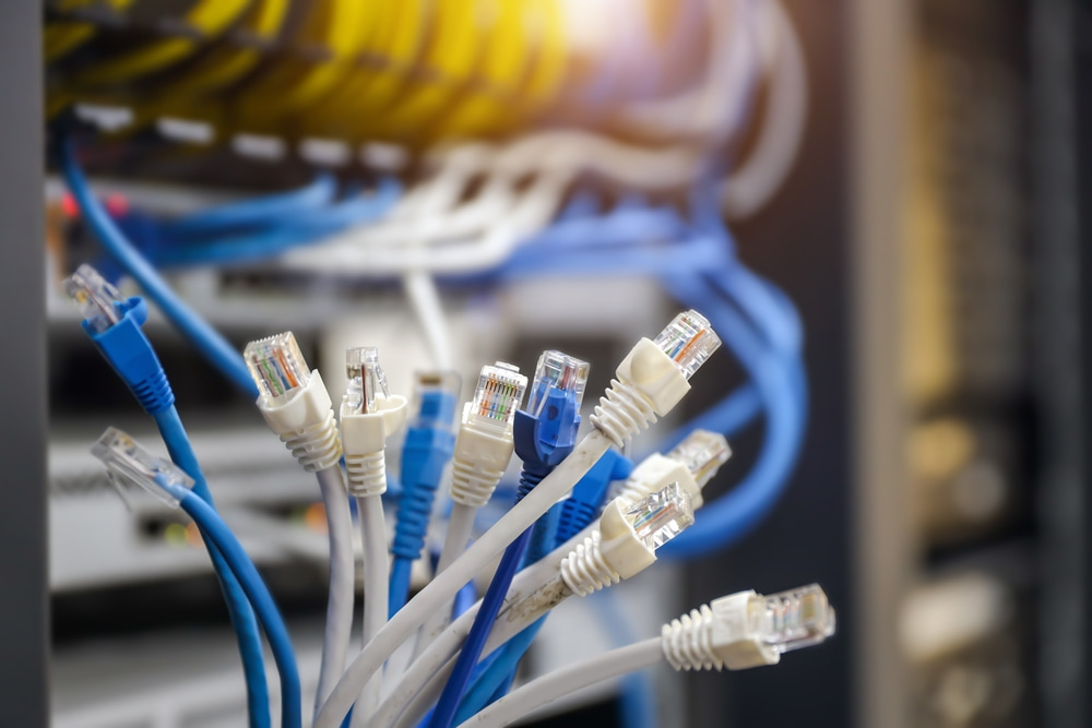 How does Ethernet cabling improve network stability